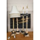 Four distress paint-finished table lamps
