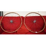 A pair of vintage French/American 'Constrictor' wooden-framed bicycle wheels