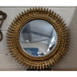 A circular gilt framed star-burst mirror, 60 cm dia