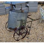 A galvanised iron-framed smallholder's liquid carrier