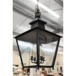 A large Georgian style dark antiqued brass hanging lantern