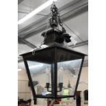 A large Georgian style dark antiqued brass hanging lantern