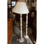 A pair of limed finished wood standard lamps (2)