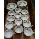 A set of twelve Royal Albert 'Month' trios