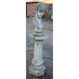 A large weathered garden bust in Romanesque style