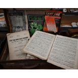 A collection of early 20th century sheet music, in leather case