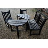 A set of weathered teak garden furniture