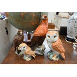 Two decanters and barn owls