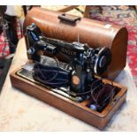 Singer sewing machine in a wooden case