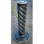 A marble/stone twist column stand