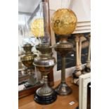 Two antique copper oil lamps