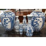A large pair of blue and white ovoid vases painted in the Oriental taste