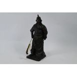 WITHDRAWN - A Chinese heavy resin polychrome figure of the war god Guandi