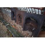 Three various Victorian cast iron fire surrounds