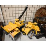 A trio of vintage large scale Tonka toys