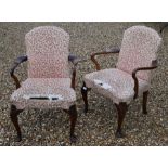 A companion pair of Georgian style open armchairs (2)