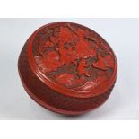 A Chinese cinnabar lacquered circular box and cover, late Qing, 19 cm diameter