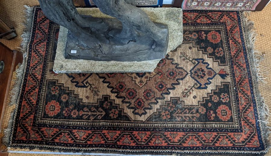 An old Belouch rug,180 cm x 115 cm