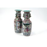 A pair of Chinese 19th century famille rose Immortals vases