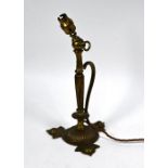 An antique brass railway carriage table-lamp