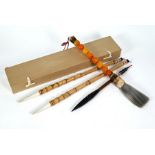 Four Chinese calligraphy brushes