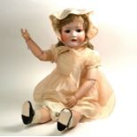 A Heubach-Koppelsdorf 302-9 bisque-headed girl doll