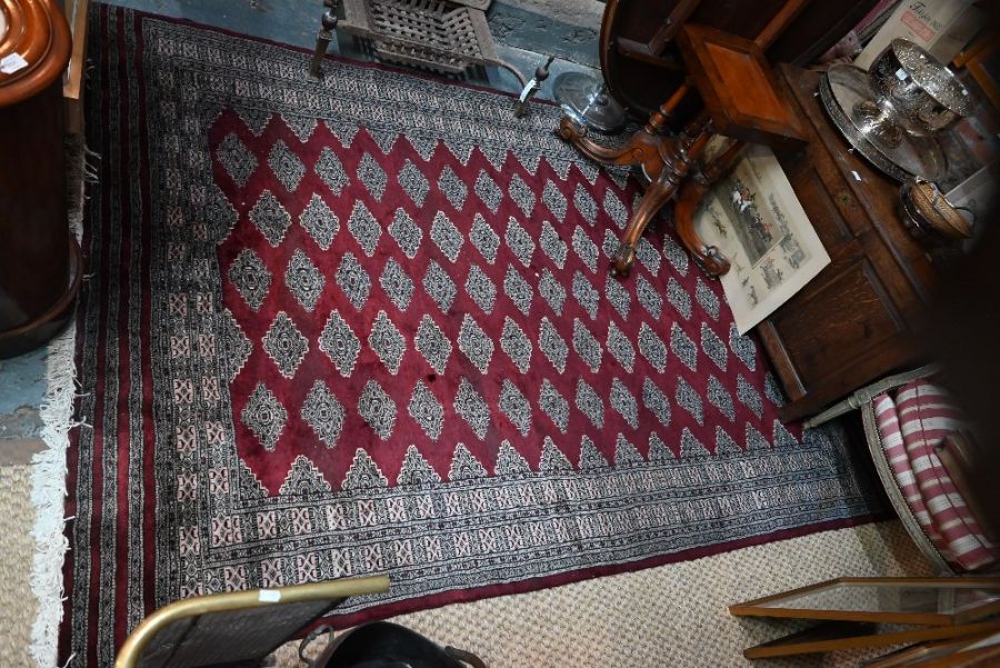 A contemporary Persian Turkoman design carpet, 270 cm x 188 cm