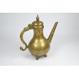 An 18th century Indian richly engraved brass tea pot