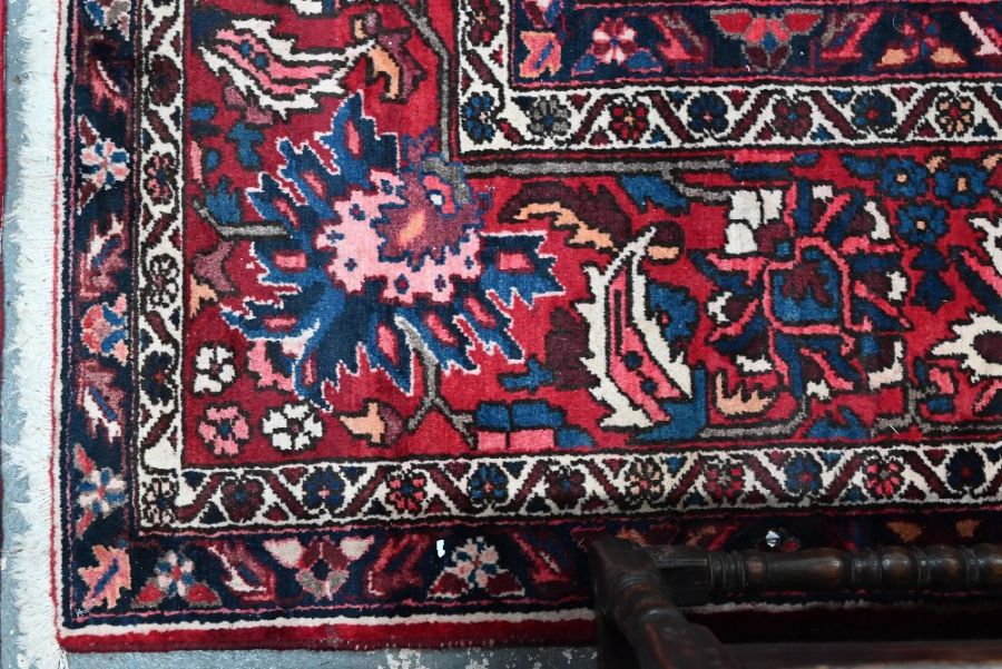 A Persian Baktiari red ground tile design carpet, 405 cm x 322 cm - Image 2 of 3