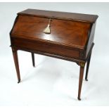 A late 19th century slope front writing bureau