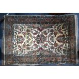 A contemporary camel ground Agra rug, 183 cm x 124 cm