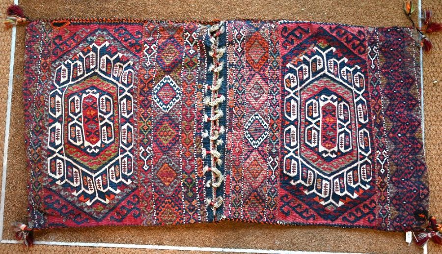 An old Caucasian flat weave double saddlebag in colours