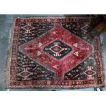 An old Persian Shiraz rug, 163 cm x 124 cm