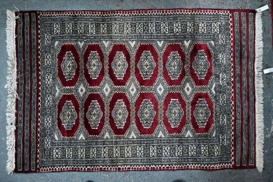 A contemporary Persian Turkoman design rug, 144 cm x 95cm