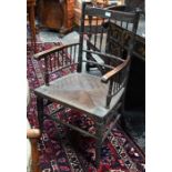 Heal & Son, an Arts & Crafts spindle back rope seat Sussex chair, 19th century
