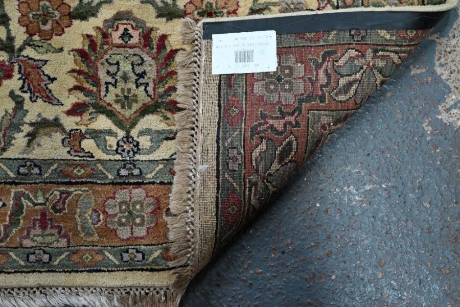 A contemporary camel ground Agra rug, 183 cm x 124 cm - Image 2 of 2