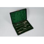 Edwardian cased silver-handled dressing set