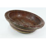 A large antique brass bound coopered bowl with wide rim
