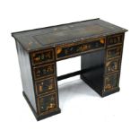 A Victorian gilt and polychrome chinoiserie decorated desk