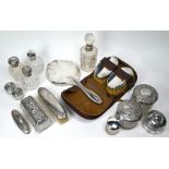 Four silver-mounted cut glass scent bottles