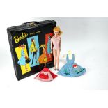 A 1961 vintage Barbie Doll Case and contents