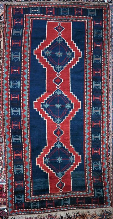 An old kazak long rug, 271 cm x 138 cm