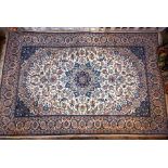 A Persian Nain carpet 312 cm x 198 cm