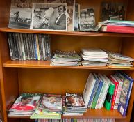 Assorted sporting photographs together with Swansea City football programmes, DVD's.