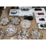 A collection of Franklin Mint model cars together with a collection of Mason Christmas plates
