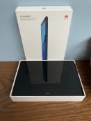 A Huawei MediaPad T5, with box and charging cable, (it does switch on,