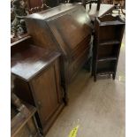 A 20th century oak bureau together with a bedside cabinet and an oak bookcase