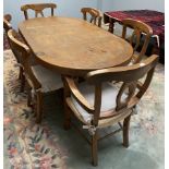 A modern dining table 99cm wide x 179cm long x 78cm high together with six chairs