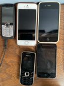 An iPhone 5, restored to factory settings, together with an 8GB iPod, an iPhone 4,