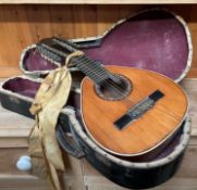 A rosewood and mother of pearl inlaid twelve string "mandriola" mandolin,